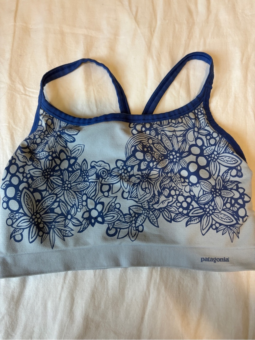 Patagonia Light Blue Sports Bra with Navy Floral Print. Size XL